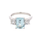 Octagonal shaped aquamarine and round brilliant cut diamond 3 stone ring Gardiner Brothers