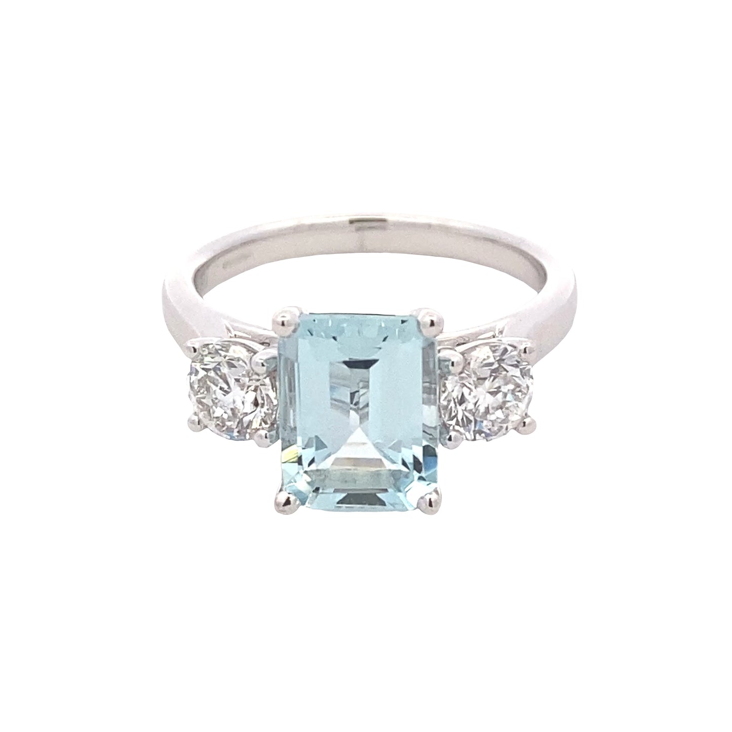 Octagonal shaped aquamarine and round brilliant cut diamond 3 stone ring Gardiner Brothers