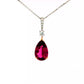 Pear Shaped Purple Garnet and Round Brilliant Cut Drop Style Pendant Gardiner Brothers