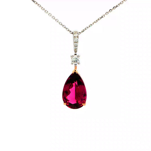 Pear Shaped Purple Garnet and Round Brilliant Cut Drop Style Pendant Gardiner Brothers