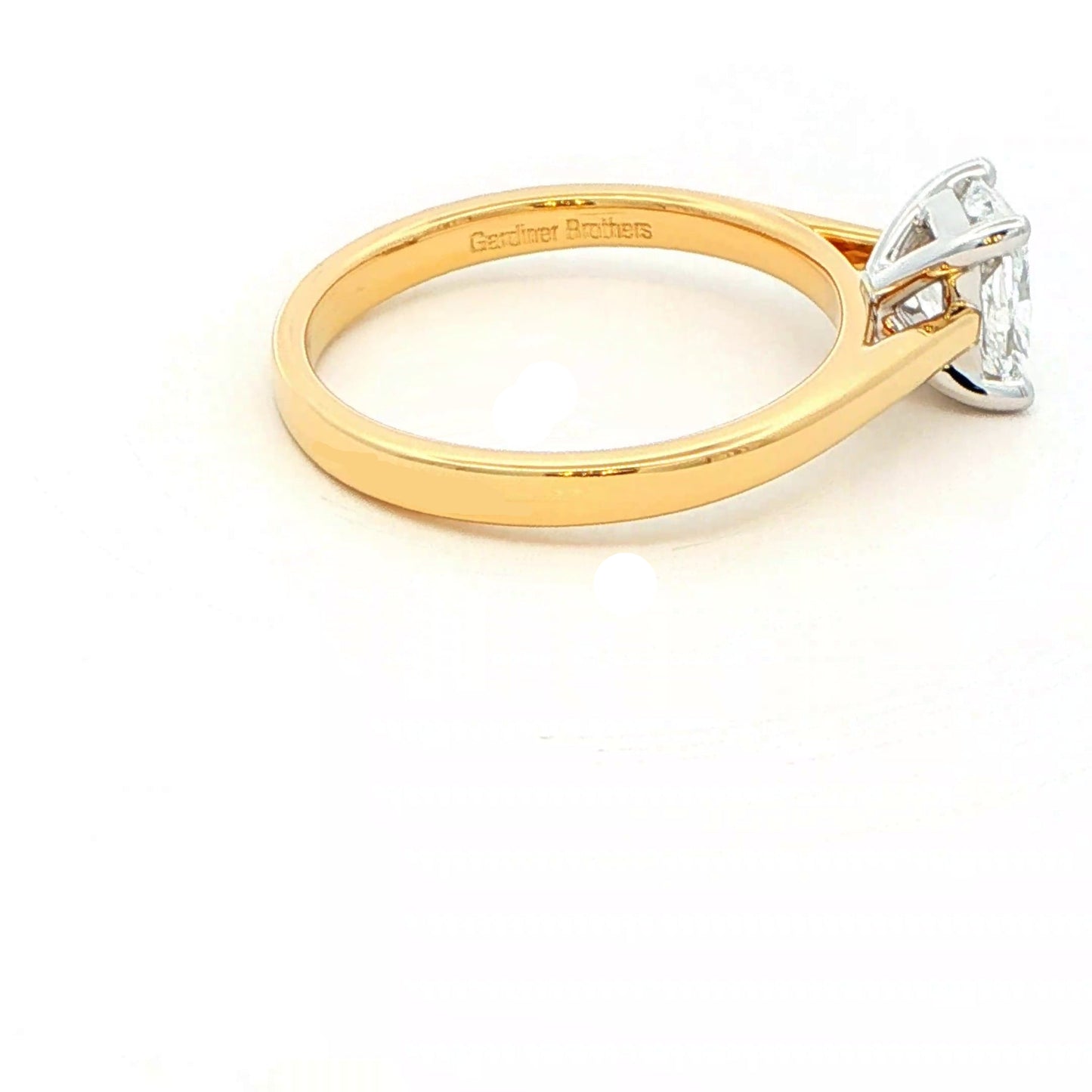 Elongated cushion shaped diamond solitaire ring - 0.90cts Gardiner Brothers