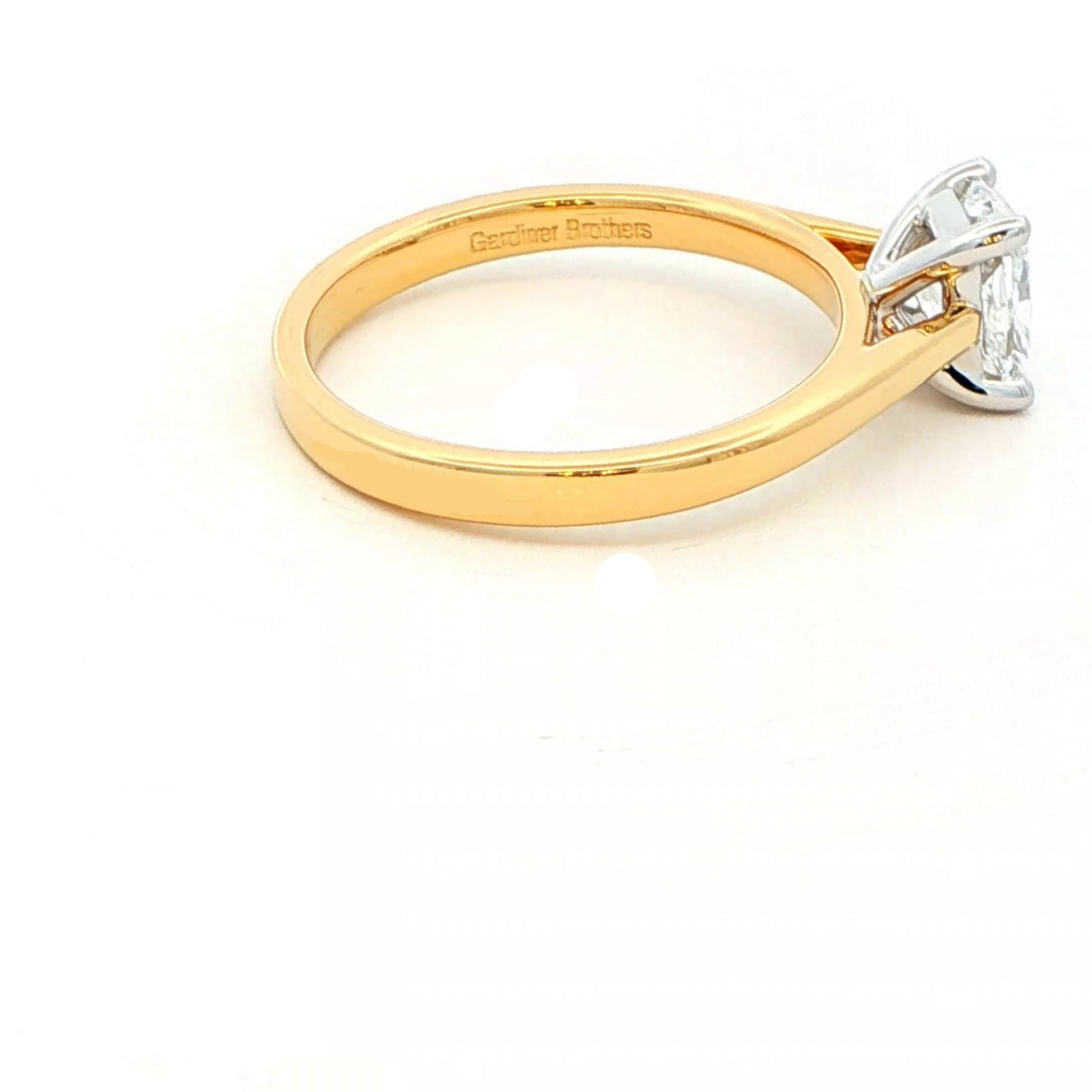 Elongated cushion shaped diamond solitaire ring - 0.90cts Gardiner Brothers