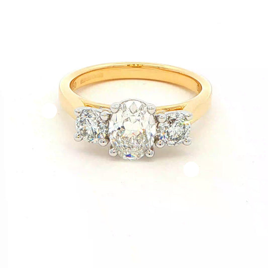 Oval and round brilliant cut diamond 3 stone ring - 1.64cts Gardiner Brothers