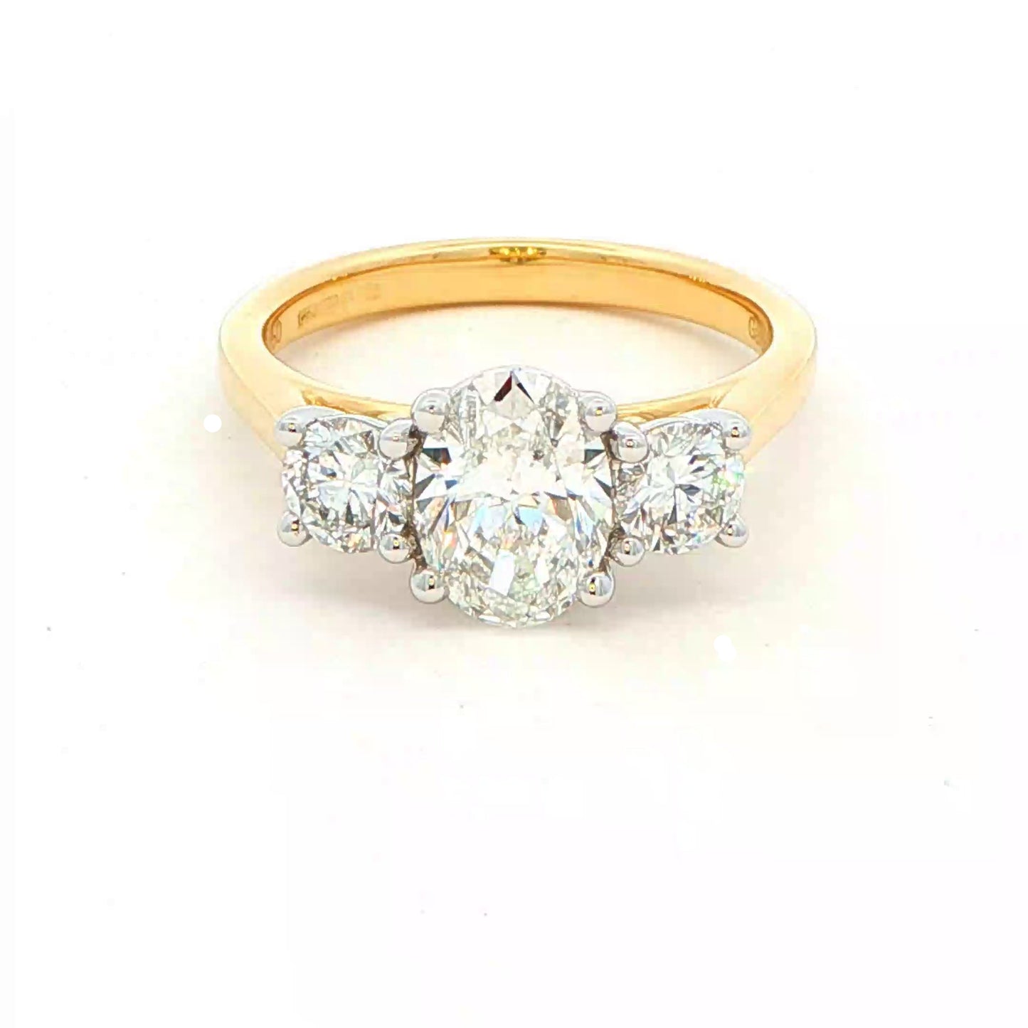 Oval and round brilliant cut diamond 3 stone ring - 1.80cts Gardiner Brothers