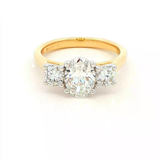 Oval and round brilliant cut diamond 3 stone ring - 1.80cts Gardiner Brothers