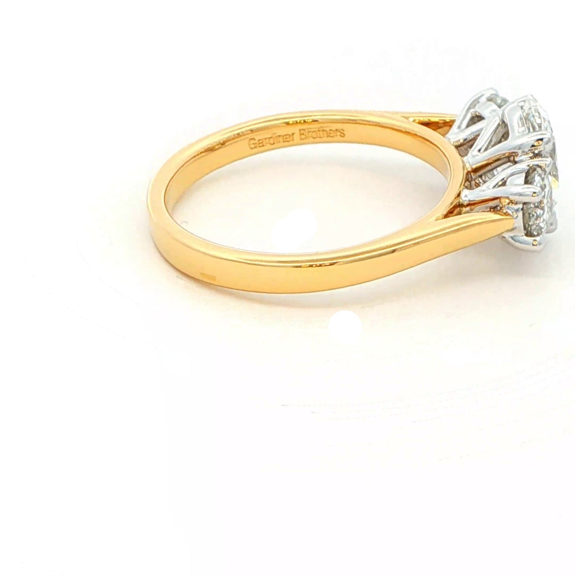 Oval and round brilliant cut diamond 3 stone ring - 1.80cts Gardiner Brothers
