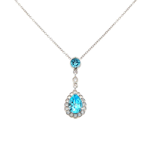 Pear Shaped Swiss Blue Topaz and Diamond Halo Drop Style Pendant Gardiner Brothers
