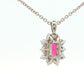 Octagonal shaped Ruby and round brilliant cut diamond cluster style pendant Gardiner Brothers