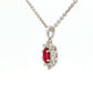 Oval shaped ruby and round brilliant cut diamond cluster style pendant Gardiner Brothers
