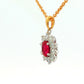 Oval shaped ruby and round brilliant cut diamond cluster style pendant Gardiner Brothers