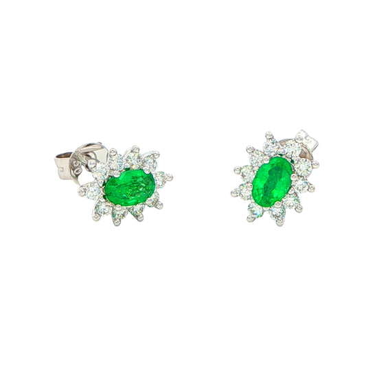 Oval shaped emerald and round brilliant cut diamond cluster style earrings Gardiner Brothers