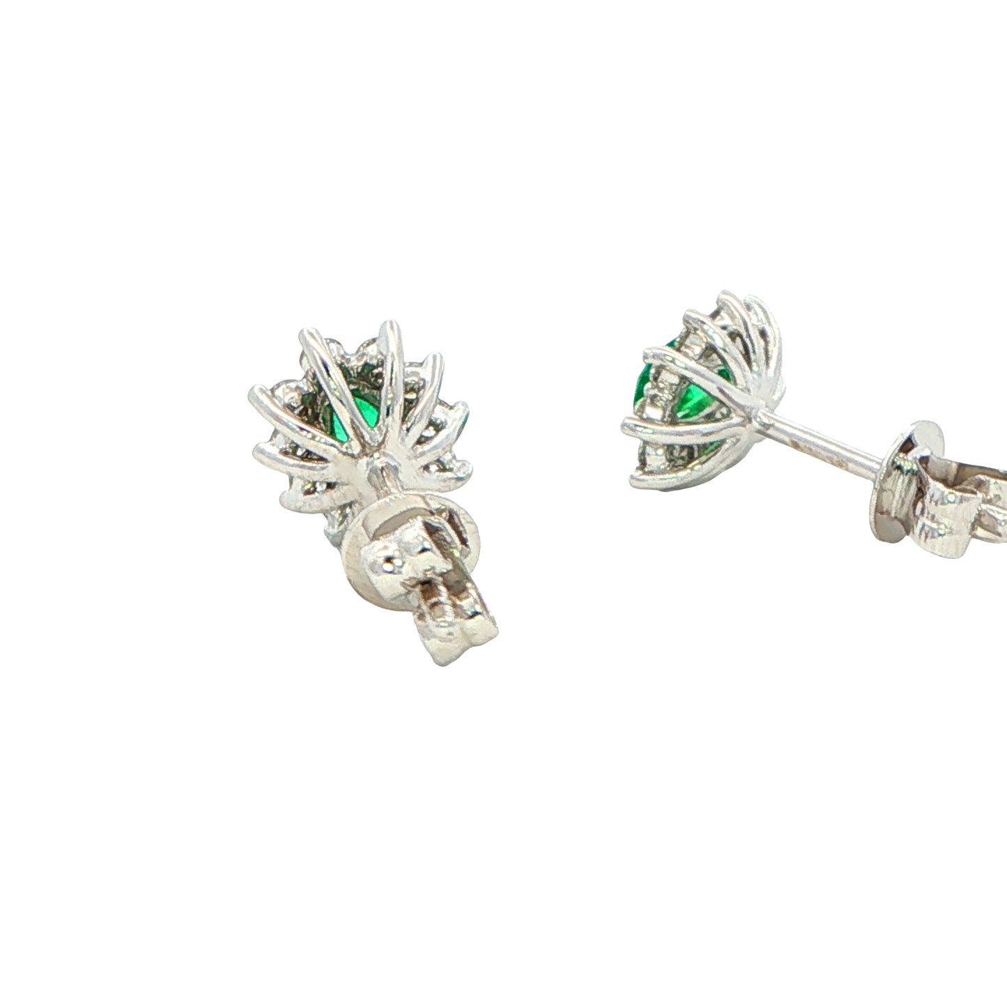 Oval shaped emerald and round brilliant cut diamond cluster style earrings Gardiner Brothers