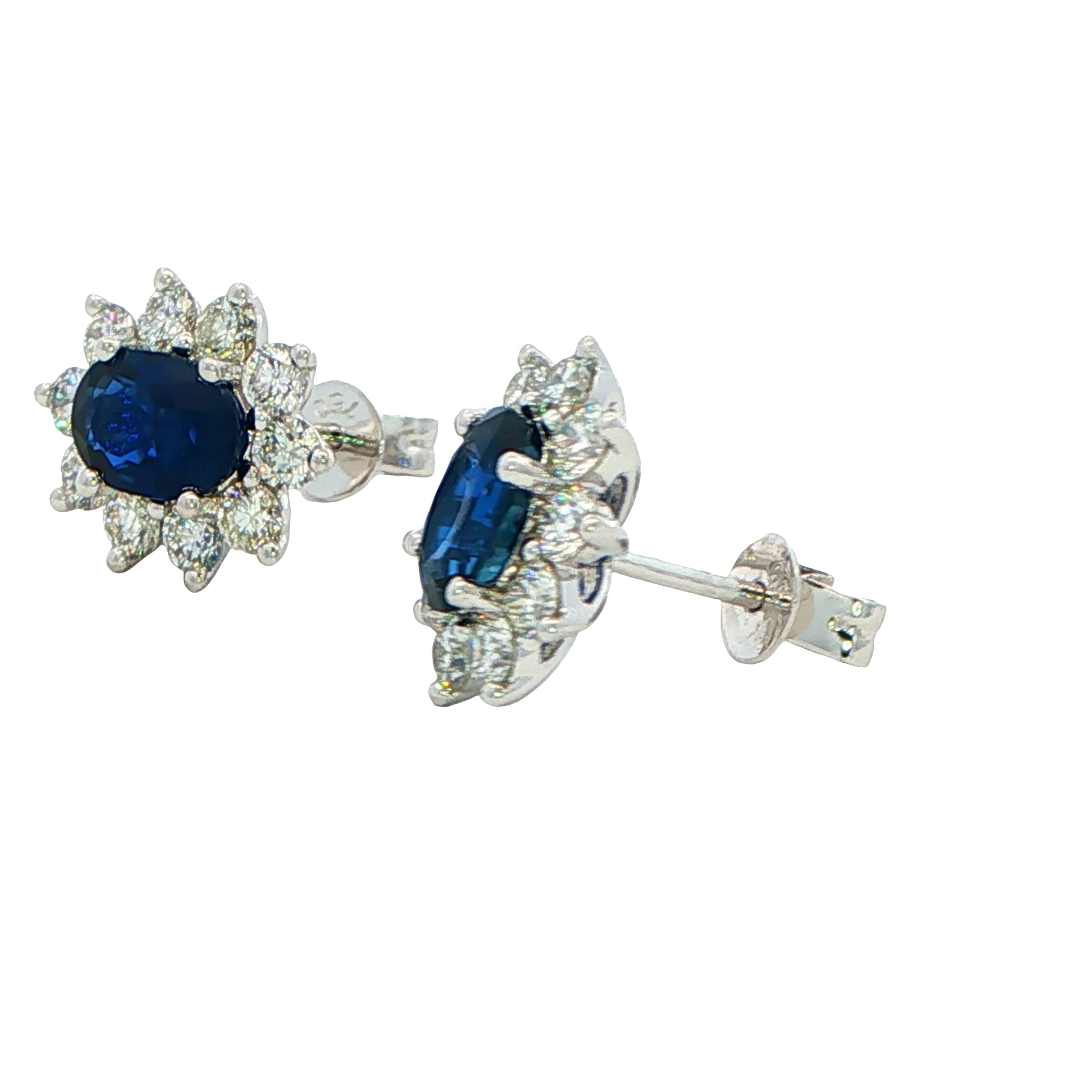 Oval shaped sapphire and round brilliant cut diamond cluster style earrings Gardiner Brothers