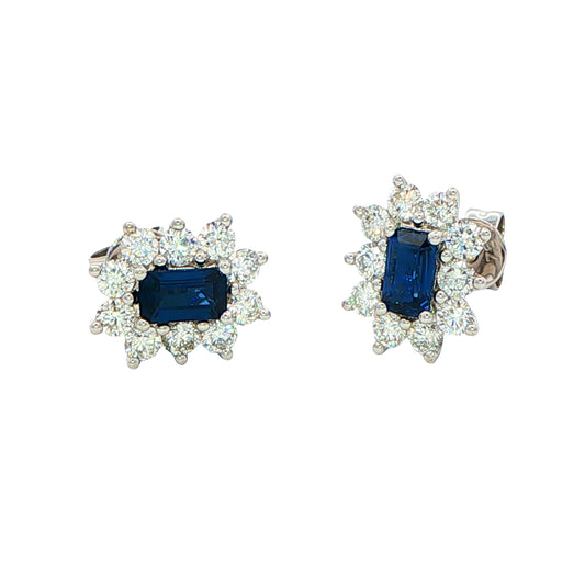 Octagonal shaped sapphire and round brilliant cut diamond cluster style earrings. Gardiner Brothers