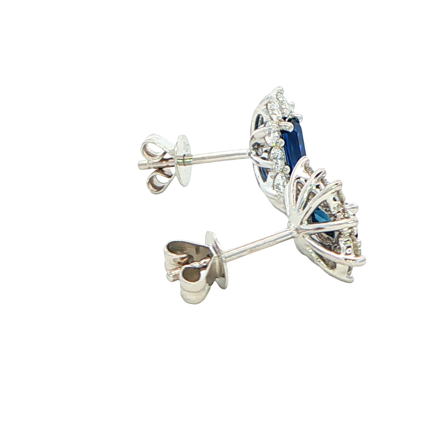 Octagonal shaped sapphire and round brilliant cut diamond cluster style earrings. Gardiner Brothers