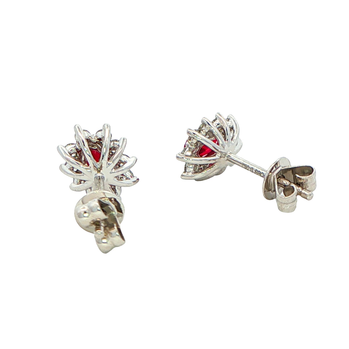 Oval shaped ruby and round brilliant cut diamond cluster style earrings Gardiner Brothers