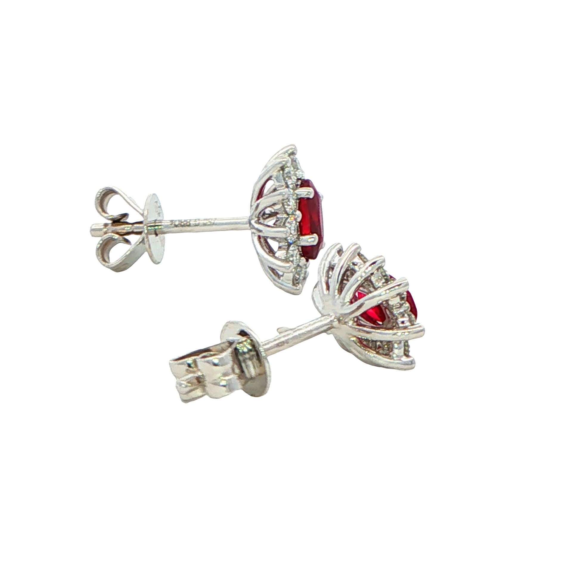 Oval shaped ruby and round brilliant cut diamond cluster style earrings Gardiner Brothers