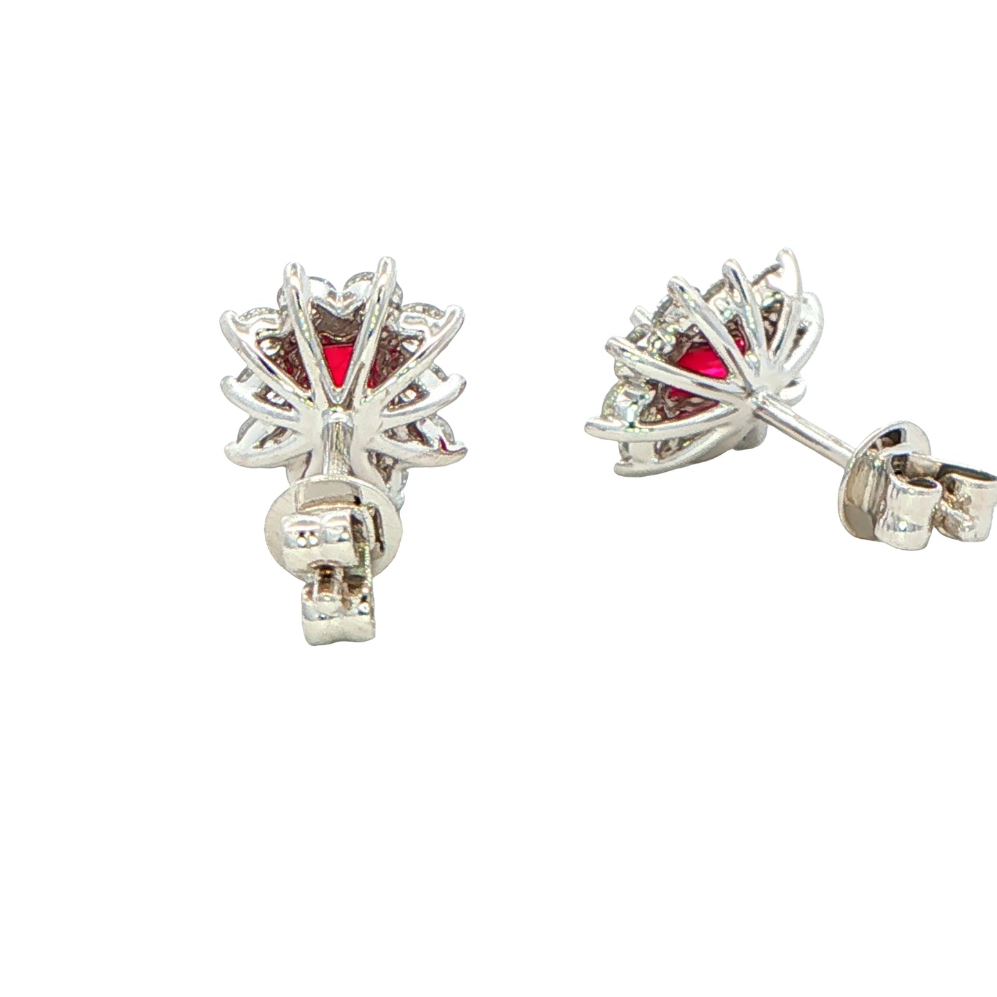 Octagonal shaped Ruby and round brilliant cut diamond cluster style earrings Gardiner Brothers