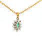 Oval shaped emerald and round brilliant cut diamond cluster style pendant Gardiner Brothers