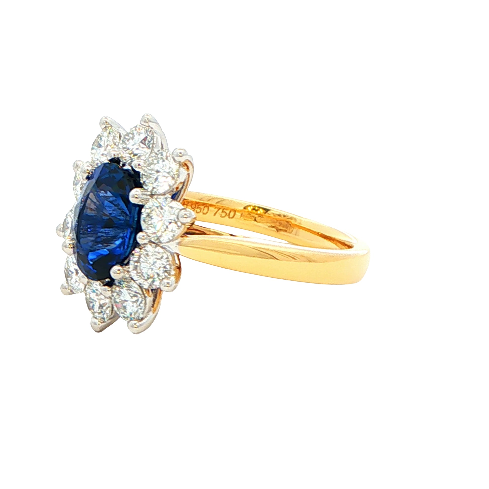 Oval Sapphire and round brilliant cut diamond cluster ring Gardiner Brothers