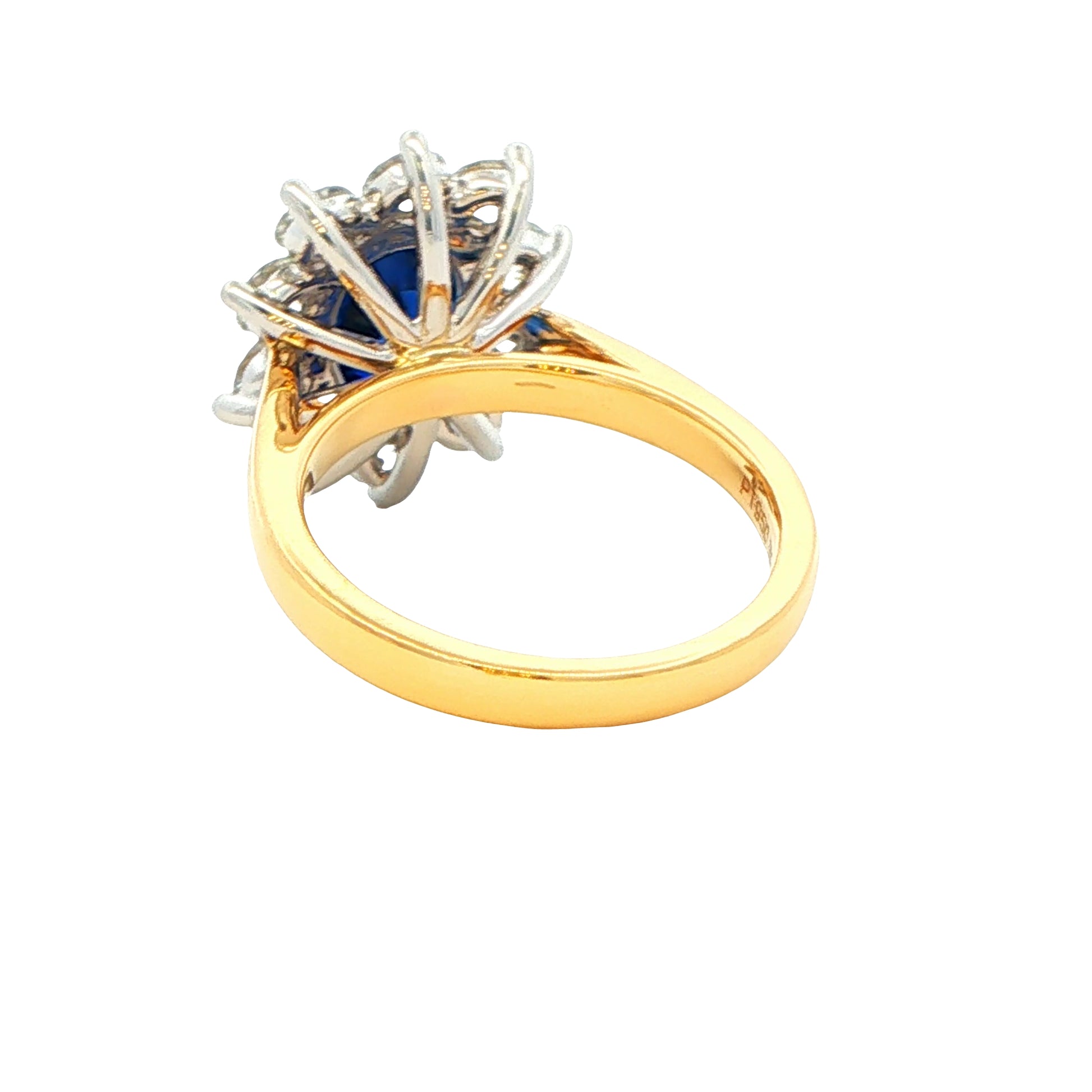 Oval Sapphire and round brilliant cut diamond cluster ring Gardiner Brothers