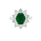Oval shaped emerald and round brilliant cut diamond cluster style ring Gardiner Brothers