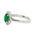 Oval emerald and diamond fancy cluster style ring Gardiner Brothers