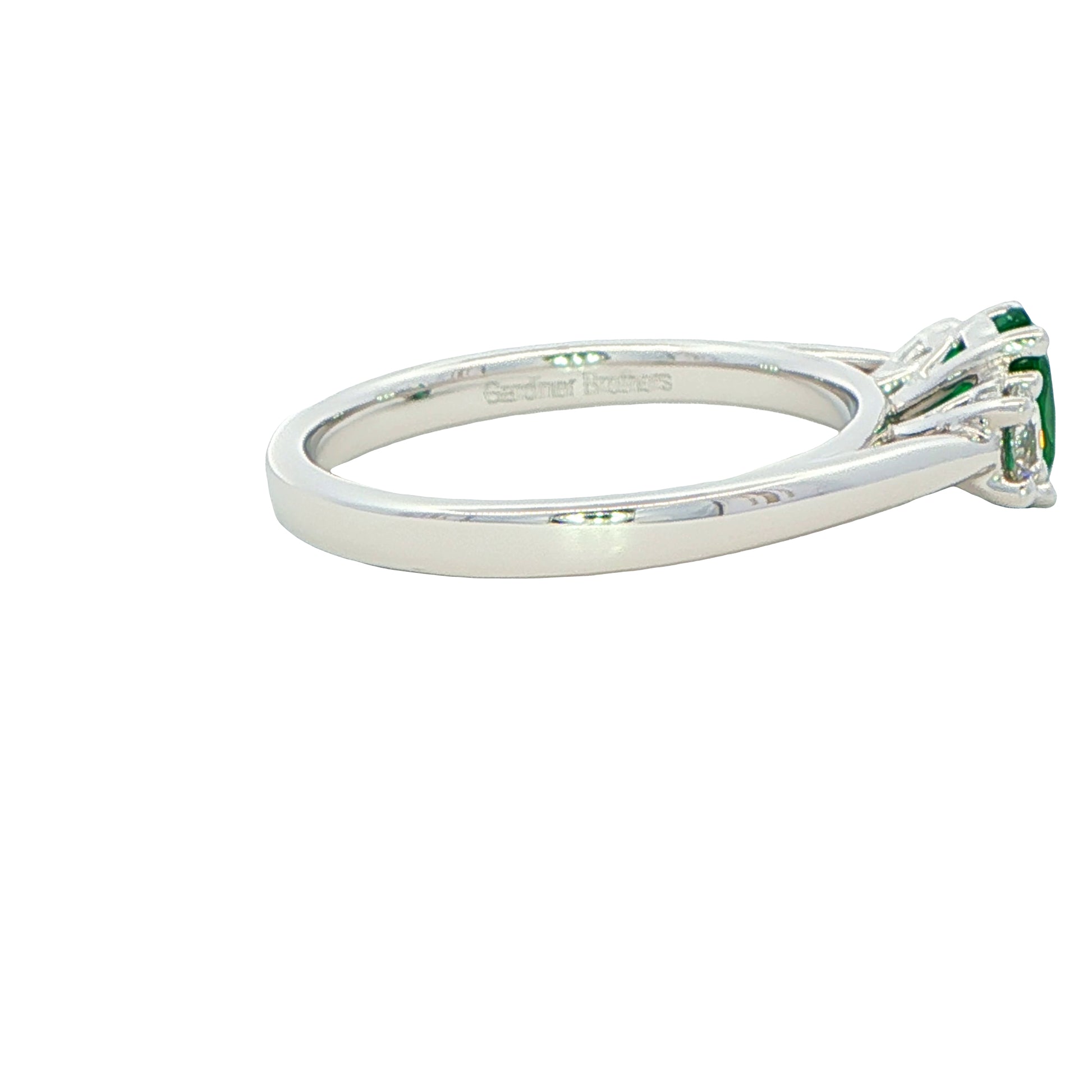 Oval Emerald and Round Brilliant Cut Diamond 3 Stone Ring Gardiner Brothers