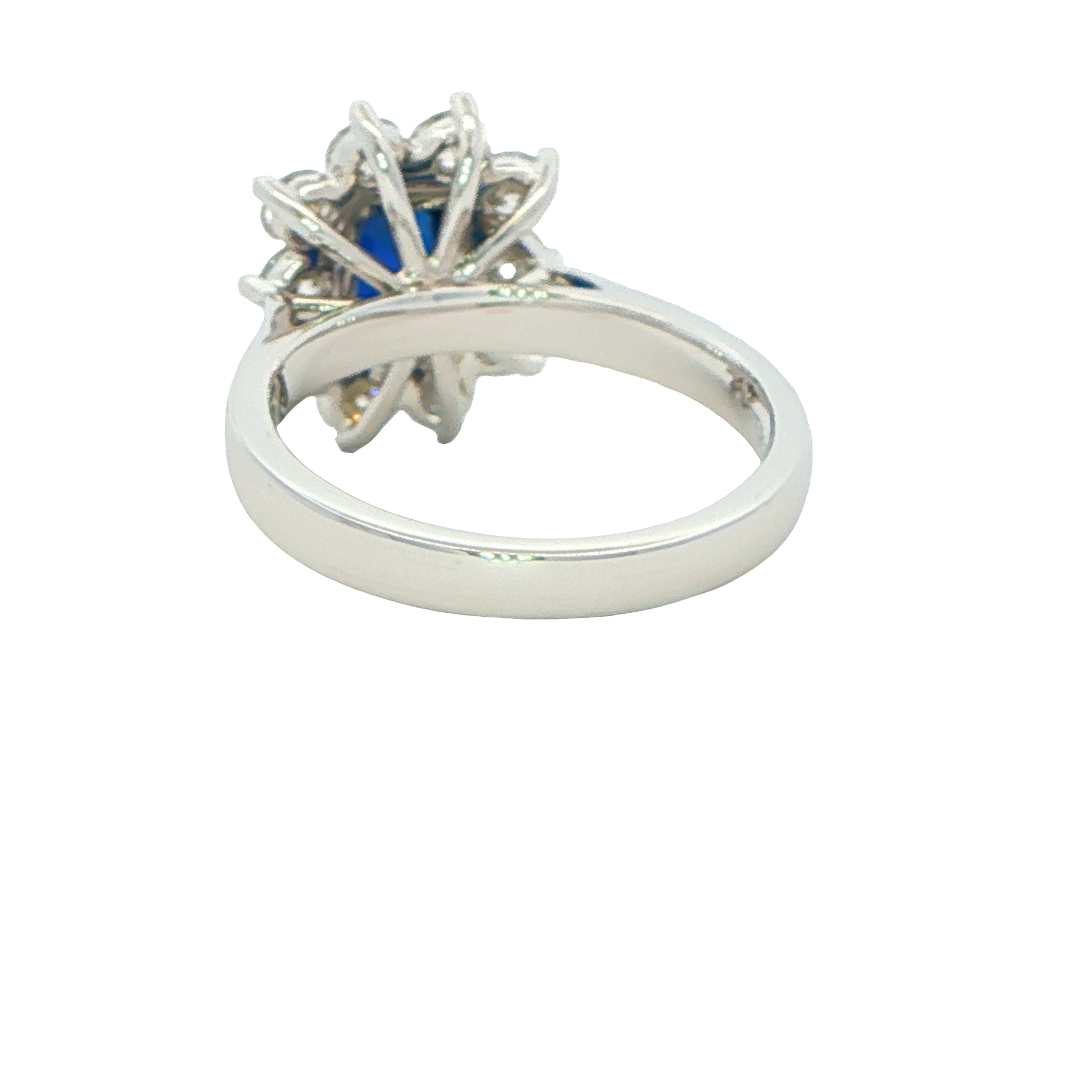 Octagonal Sapphire and round brilliant cut diamond cluster ring Gardiner Brothers