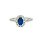 Oval shaped sapphire and round brilliant cut diamond halo style ring Gardiner Brothers