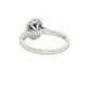 Oval shaped sapphire and round brilliant cut diamond halo style ring Gardiner Brothers