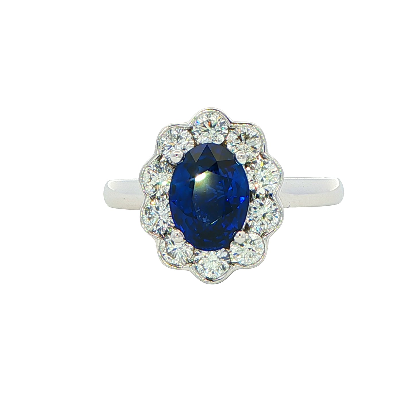 Oval Sapphire and Diamond Modern Cluster Style Ring Gardiner Brothers