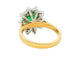 Octagonal shaped Emerald and round brilliant cut diamond cluster style ring Gardiner Brothers
