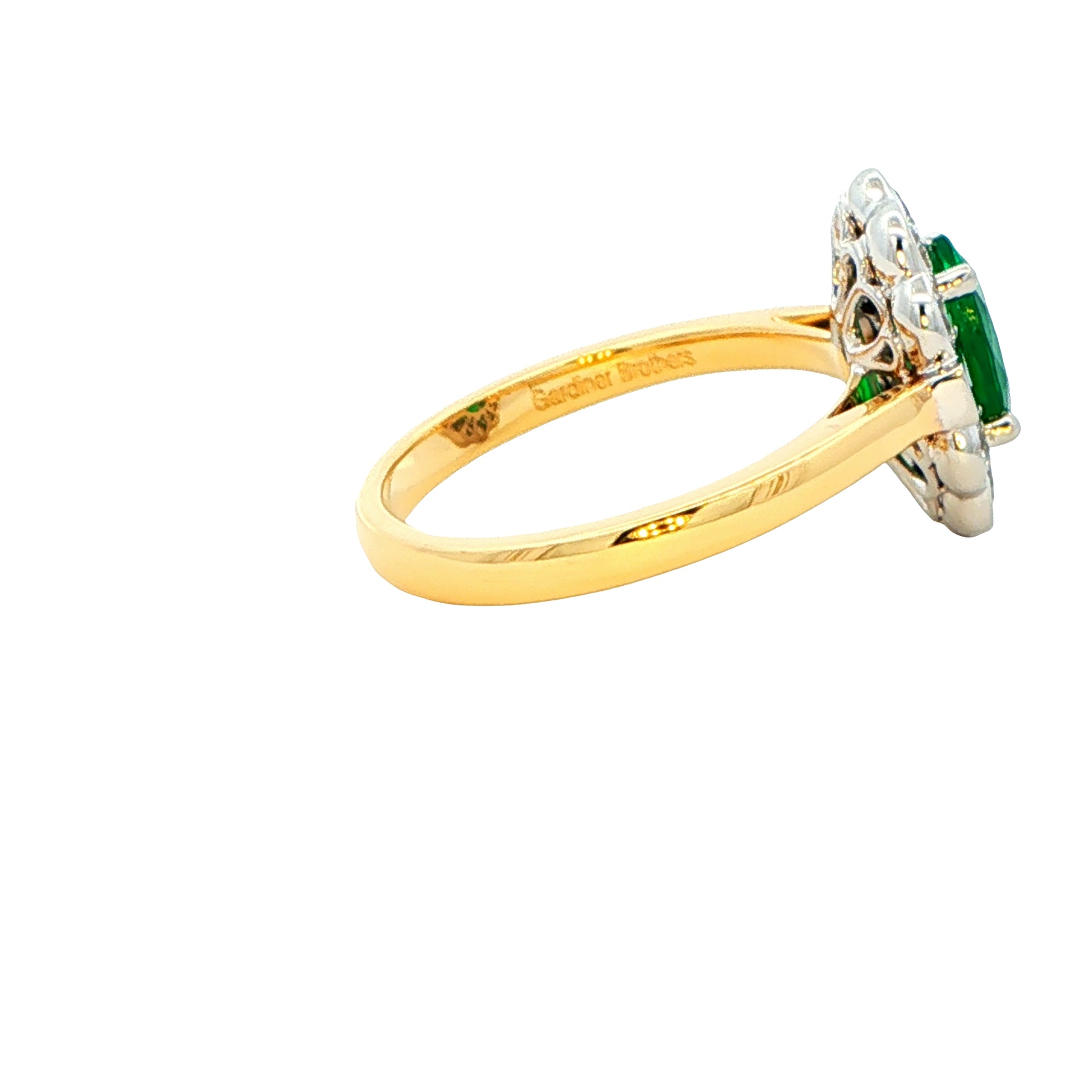 Oval emerald and Diamond Fancy Cluster Style Ring Gardiner Brothers