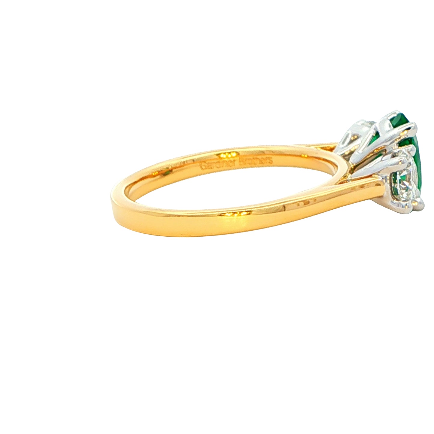 Oval Emerald and Round Brilliant Cut Diamond 3 Stone Ring Gardiner Brothers