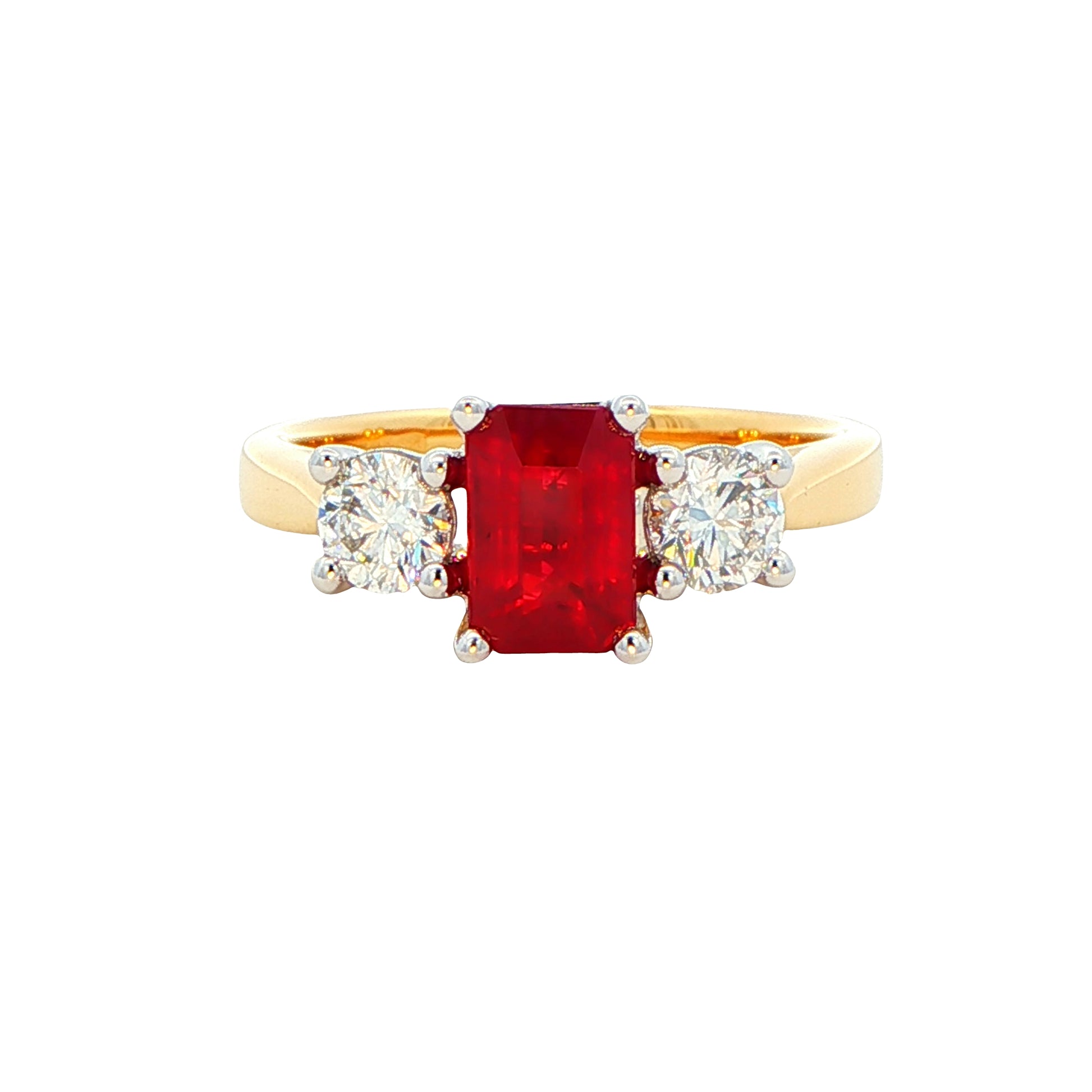 Octagonal Ruby and round brilliant cut diamond 3 stone ring Gardiner Brothers
