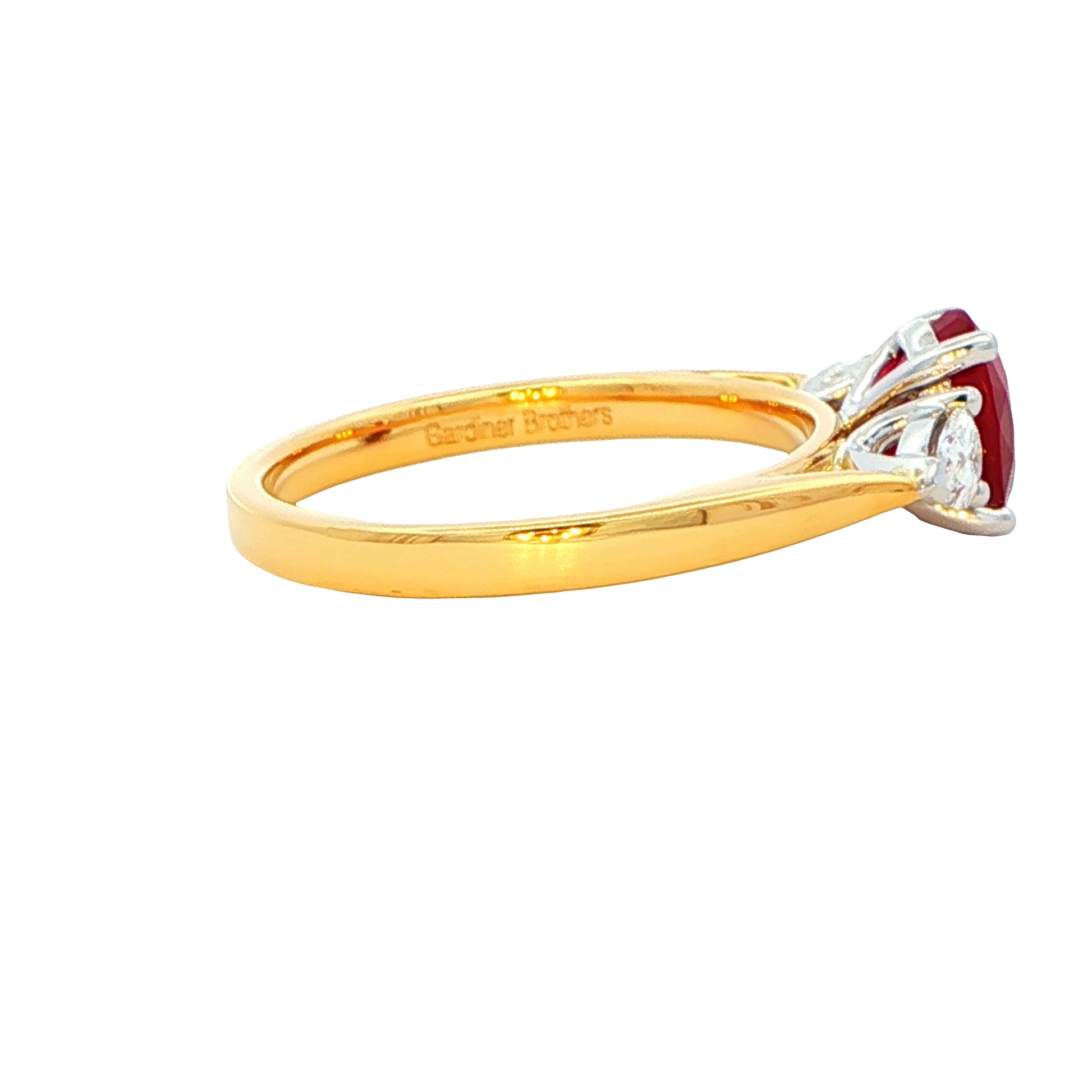 Oval Ruby and pear shaped diamond 3 stone ring Gardiner Brothers