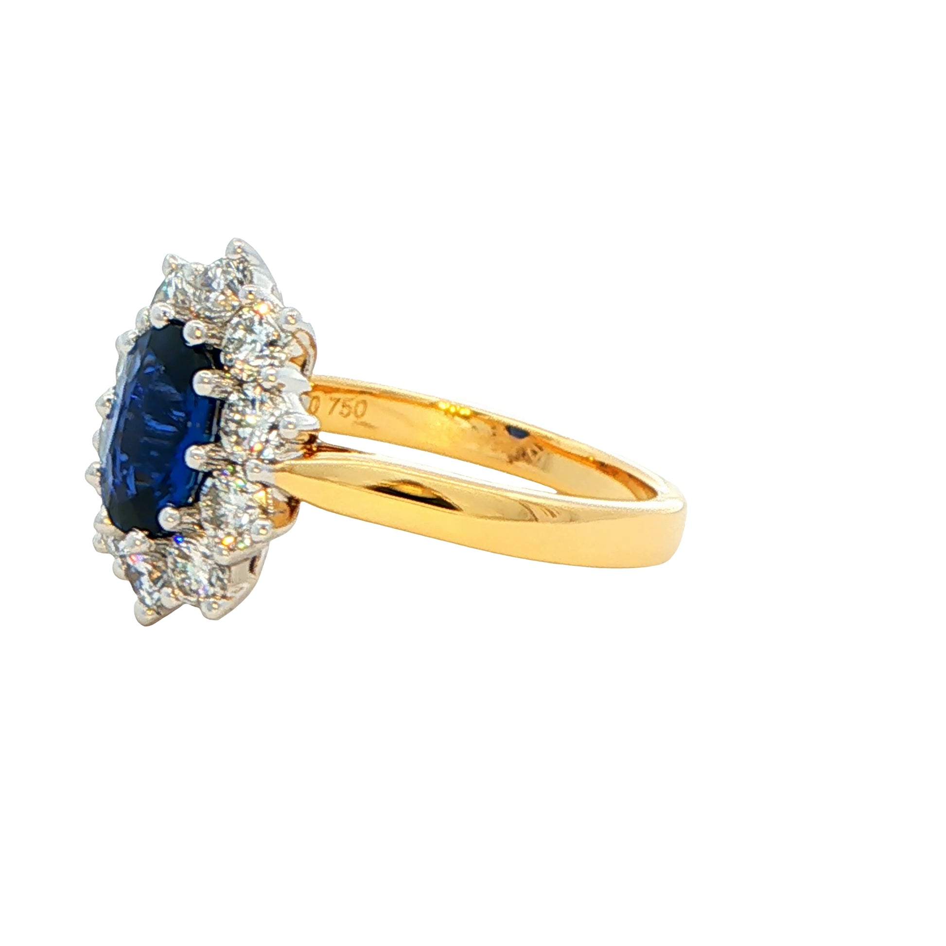 SAPPHIRE AND ROUND BRILLIANT CUT DIAMOND CLUSTER STYLE RING Gardiner Brothers