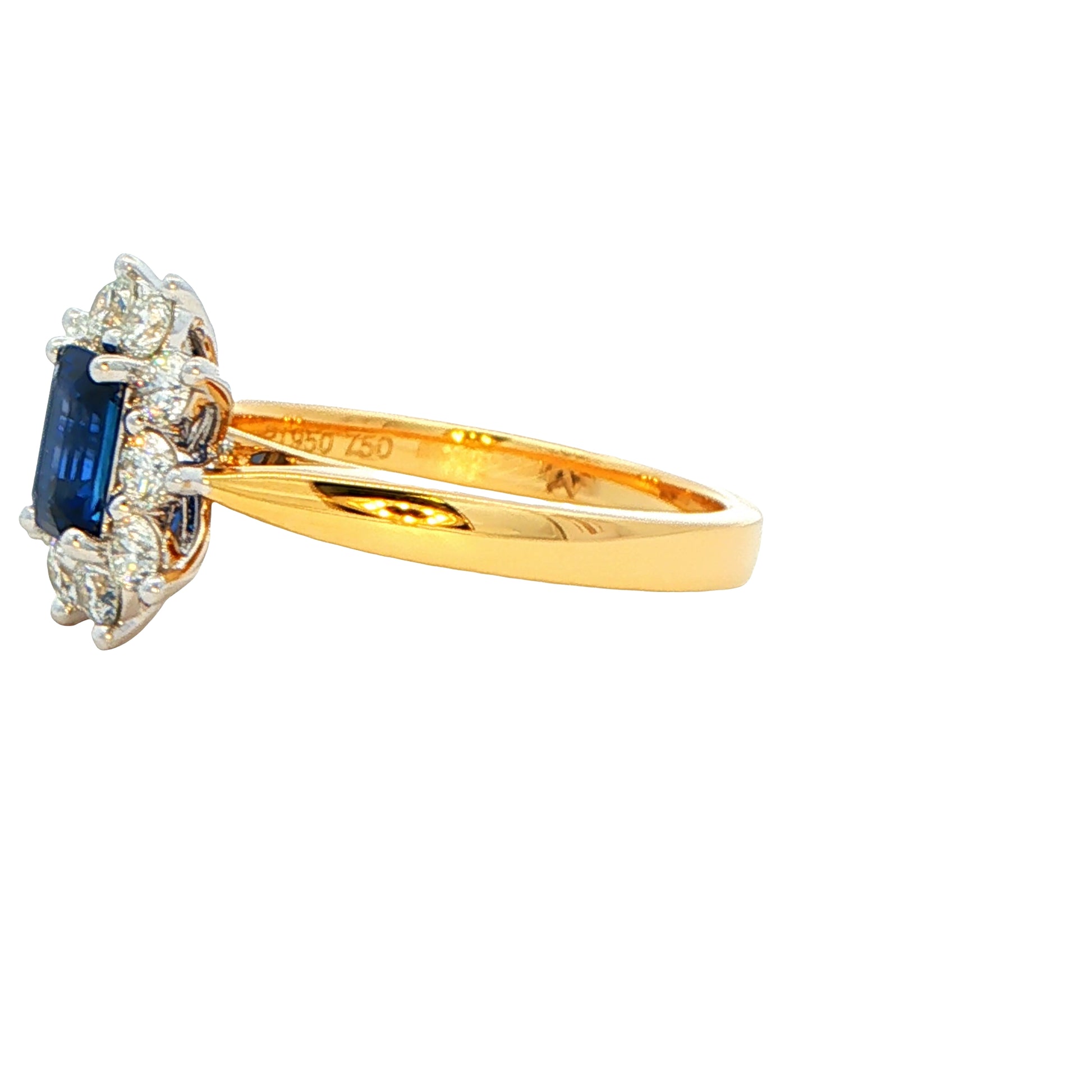 Octagonal Shaped Sapphire and round brilliant cut diamond cluster ring Gardiner Brothers