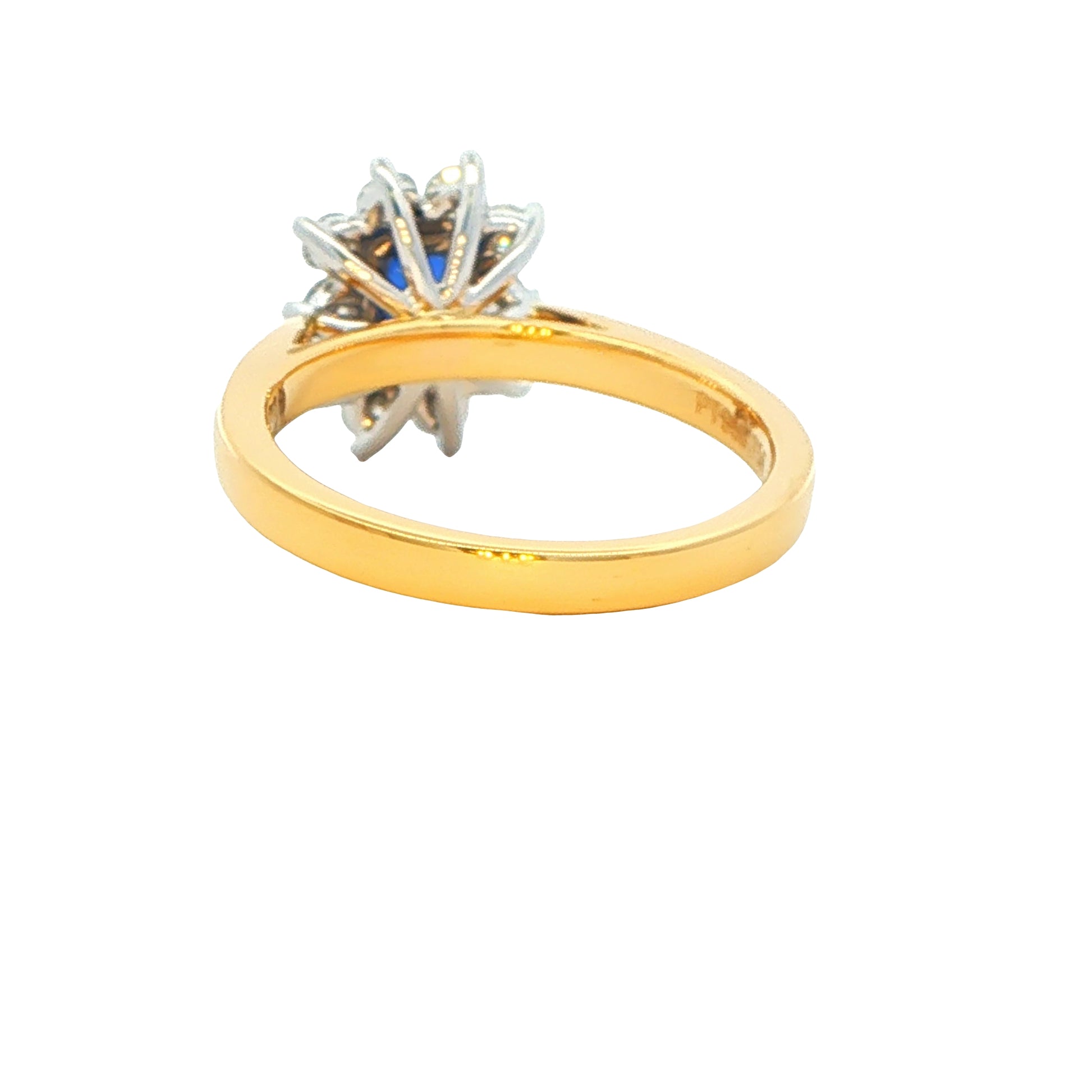 Octagonal Shaped Sapphire and round brilliant cut diamond cluster ring Gardiner Brothers