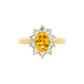 Oval Shaped Yellow Sapphire and round brilliant cut diamond cluster ring Gardiner Brothers