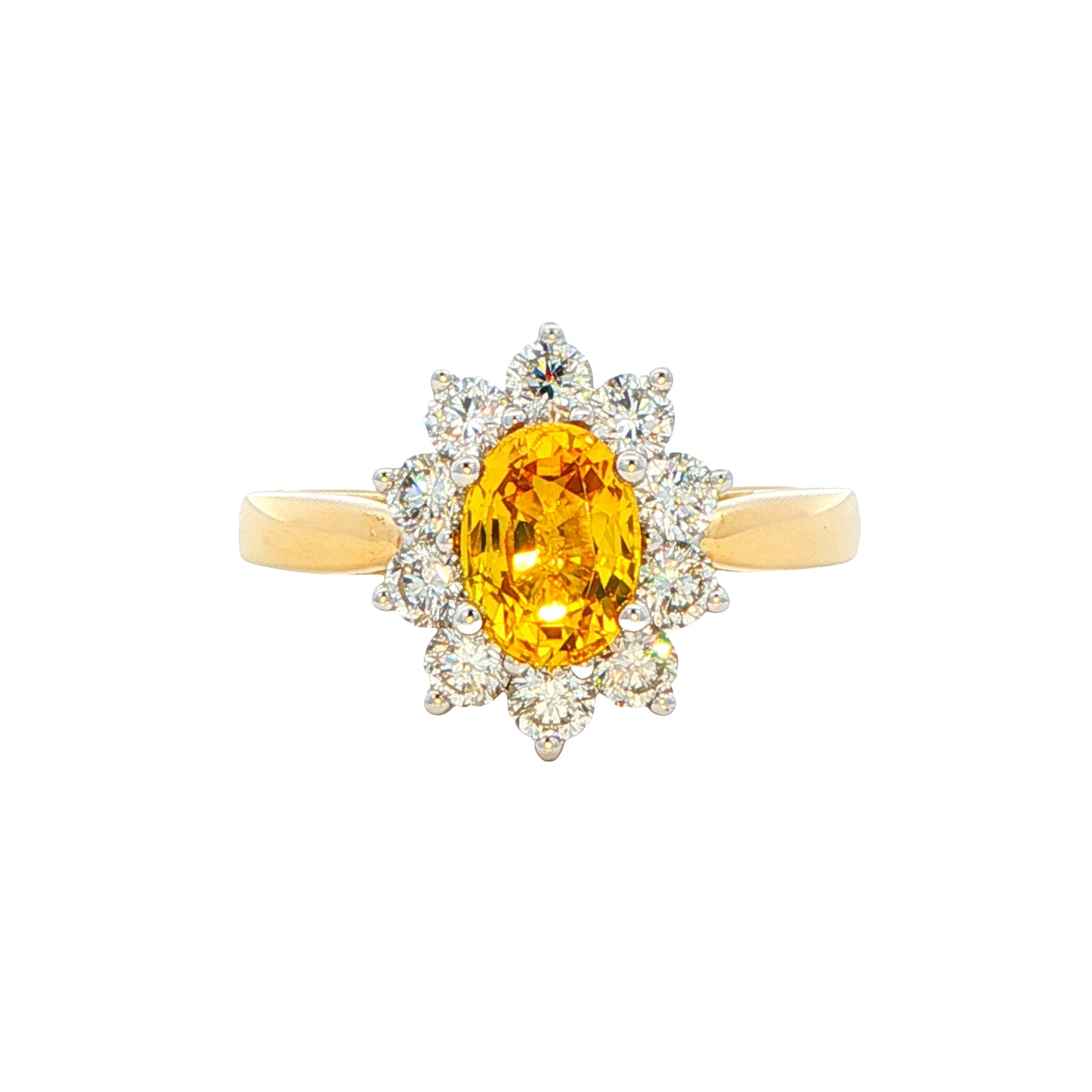 Oval Shaped Yellow Sapphire and round brilliant cut diamond cluster ring Gardiner Brothers