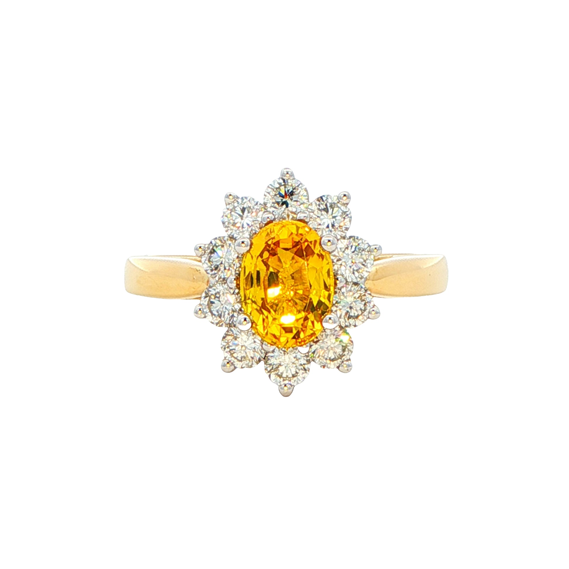 Oval Shaped Yellow Sapphire and round brilliant cut diamond cluster ring Gardiner Brothers