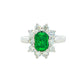 Octagonal shaped emerald and round brilliant cut diamond cluster style ring Gardiner Brothers