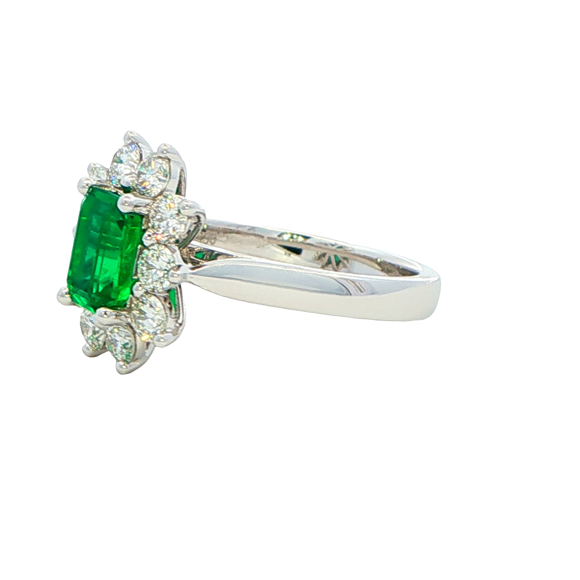 Octagonal shaped emerald and round brilliant cut diamond cluster style ring Gardiner Brothers