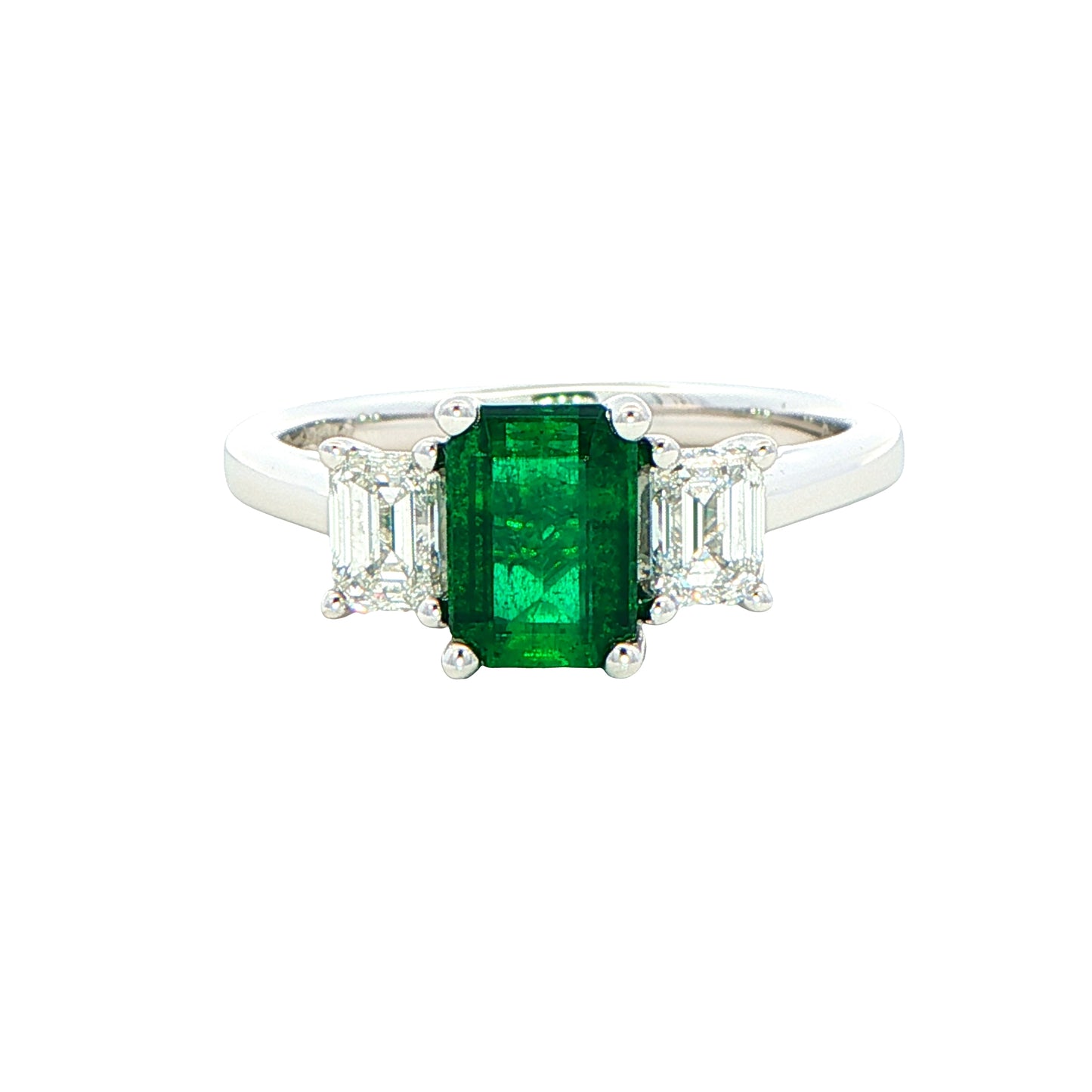 Octagonal Emerald and diamond 3 stone ring Gardiner Brothers