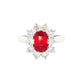 Octagonal shaped ruby and round brilliant cut diamond cluster ring Gardiner Brothers