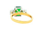 Octagonal shaped emerald and round brilliant cut diamond 3 stone ring Gardiner Brothers
