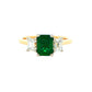 Octagonal shaped emerald and emerald cut diamond 3 stone ring Gardiner Brothers