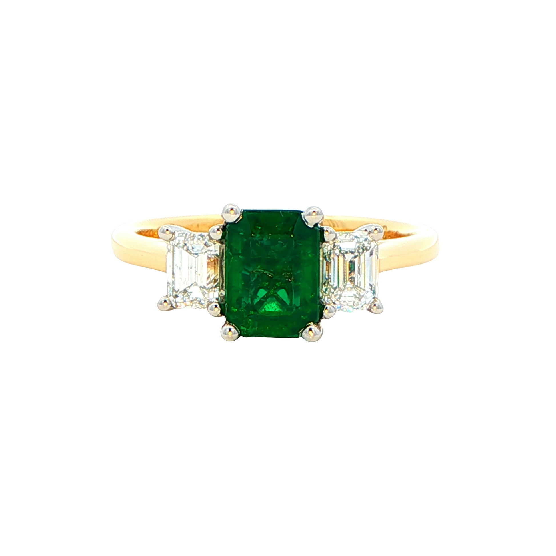 Octagonal shaped emerald and emerald cut diamond 3 stone ring Gardiner Brothers
